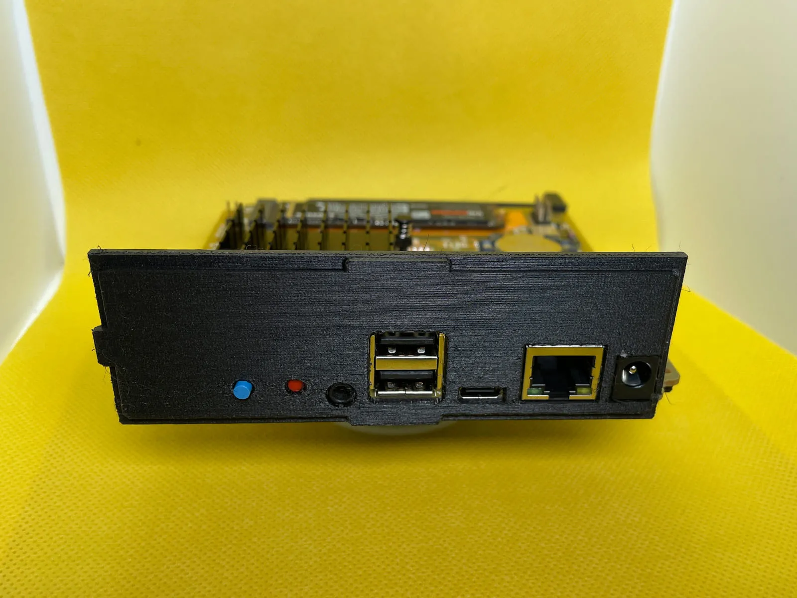 Front view of HA Yellow in 3D printed rack mount panel