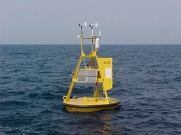 NOAA buoy 44025, a yellow 3-meter discus buoy, off the south shore of Long Island