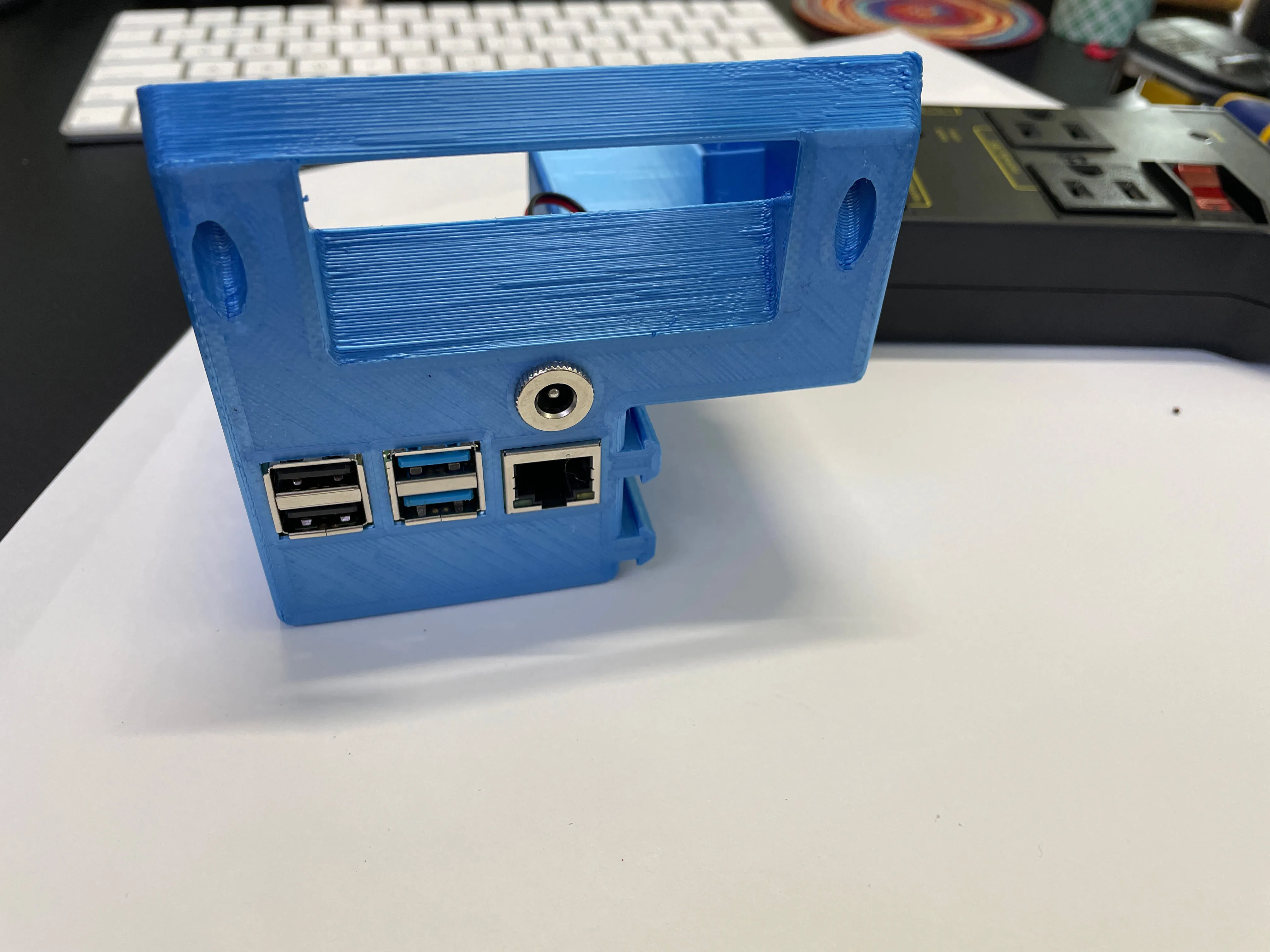 Back of the printed enclosure with the female barrel connector installed